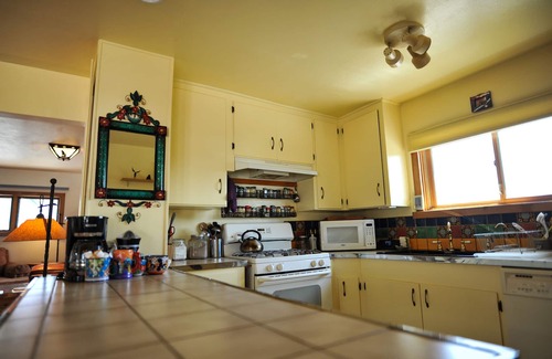 Tyrone House | Large Picture Windows for Viewing Mountains and wildlife