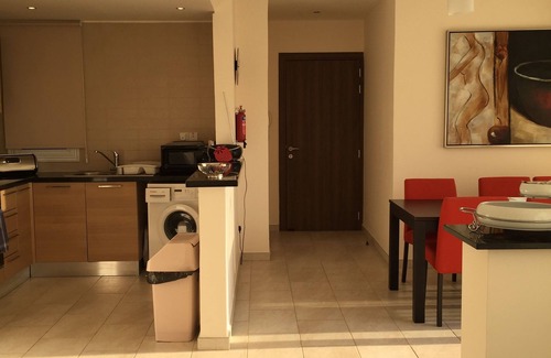 Peyia Town Apartment | Large Terrace, Sea Views, Shared Pool, Free WiFi, UK TV Package, Air Con, Lift