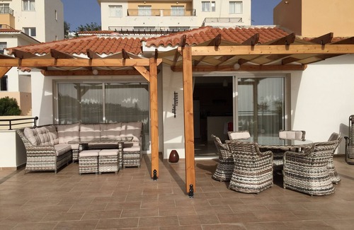 Peyia Town Apartment | Large Terrace, Sea Views, Shared Pool, Free WiFi, UK TV Package, Air Con, Lift