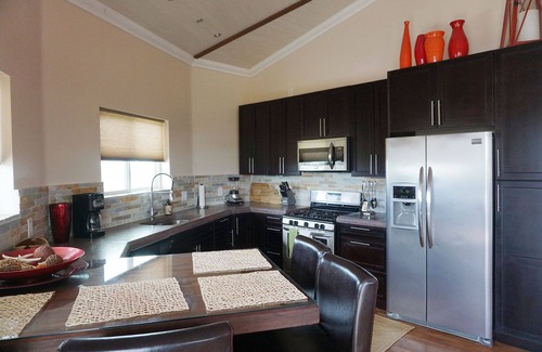 Staniel Cay Villa | Layin' Low includes one golf cart/villa with water views
