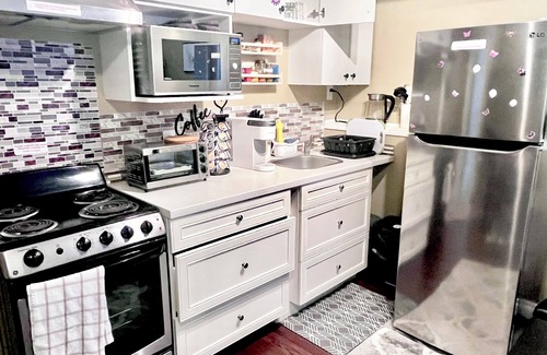 Southwest Calgary House | Legal Walkout suite with King-bed, Kitchen, Parking & Patio