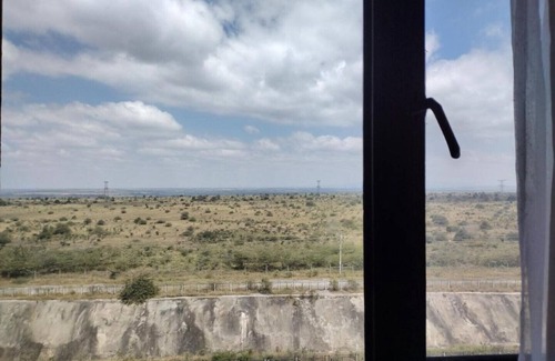 Syokimau Apartment | Lenayan Park View.Calming Views of Nairobi National Park from your room/balcony!