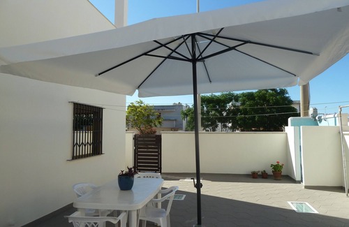 Lido Marini Apartment | LIDO MARINI - LOVELY VACATION HOME WITH LARGE EQUIPPED OUTDOOR COURTYARD