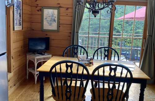 Kents Hill House | Light-Filled Log Home, 4 Wooded Acres, & Lake Access. The water is 0.4 mi away.