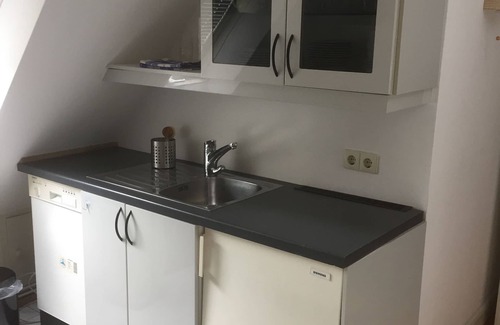 Nienstedten Apartment | Light-flooded top floor apartment in an old villa