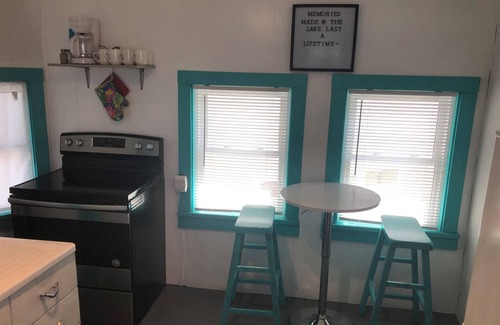 Arnolds Park Cottage | Lisa Cottage located 5 min walk from Arnolds Park!