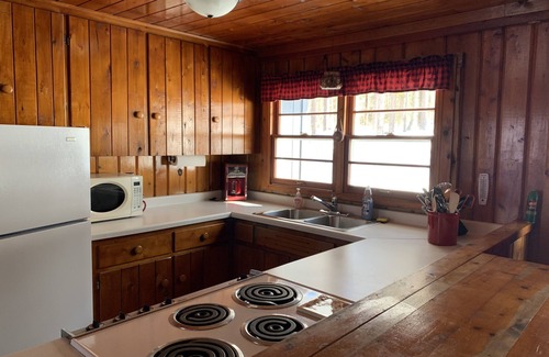 Wetmore Cabin | LLC-Peaceful, Lakefront Cabin Near Munising with Canoe & Rowboat