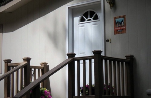 Priest River House | Located in a private wooded area with a lovely creekfront trail to explore.