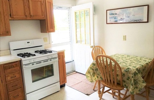 Falmouth Condo | Location, Location! New listing Steps to Surf Drive Beach, sleeps 5,deck, yard