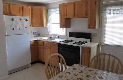Falmouth Condo | Location, Location! New listing Steps to Surf Drive Beach, sleeps 5,deck, yard