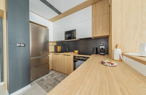 Baluty Apartment | Łódź Spacious Apartments with Parking and Balcony by Rentujemy