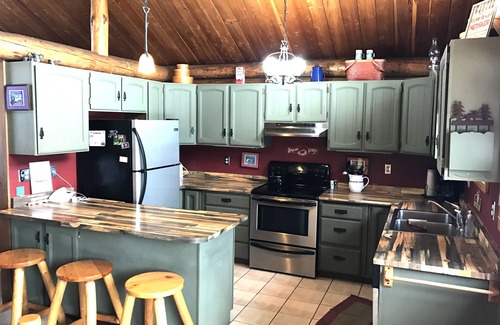 Condon Cabin | Log Cabin Getaway with Scenic Mountain Views in Montana’s Seeley-Swan Valley