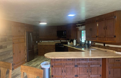 Irma Cabin | Log Cabin on 40 acres with a private lake