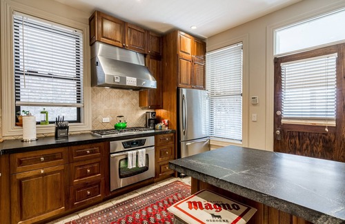 Logan Square Apartment | Logan Blvd Luxury! Enjoy the Well-Equipped Kitchen and Prime Location by AllSet Turnover