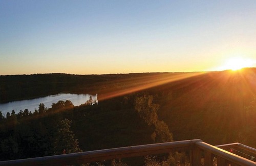 Vetlanda House | Look forward to a magnificent lake panorama in this modern and comfortable vacation home!