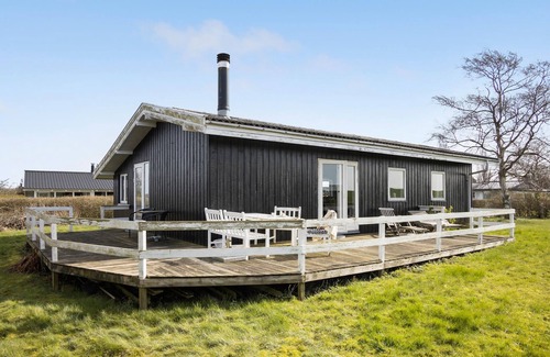 Skastrup Strand House | Look forward to relaxation and proximity to the beach in this cozy vacation home.