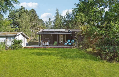 Smidstrup Strand House | Look forward to vacationing in this inviting cottage near the beach.