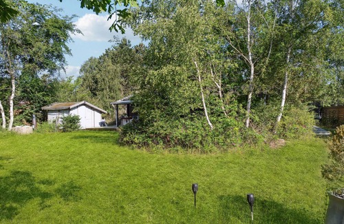 Smidstrup Strand House | Look forward to vacationing in this inviting cottage near the beach.