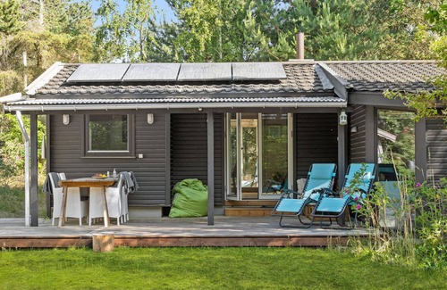 Smidstrup Strand House | Look forward to vacationing in this inviting cottage near the beach.