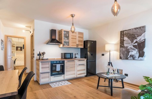 Levico Terme Apartment | Lovely Apartment “Wellness Lodge Diletta” with Lake View, Balcony, Whirlpool & Sauna