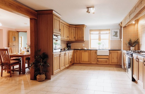 Devils Bridge House | Lovely countryside farm house with large hot tub and disabled friendly. Sleeping 12