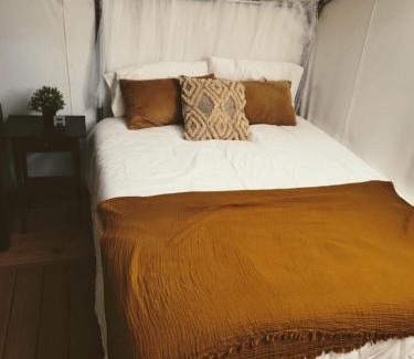 Squires Other | Lovely Safari Tent with Treetop Views for Family Glamping in Missouri