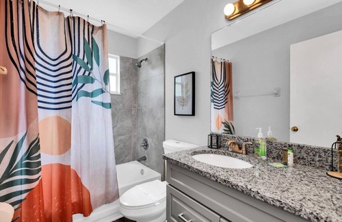 Kissimmee Condo | Lovely vibrant mid-century escape condo by Disney!