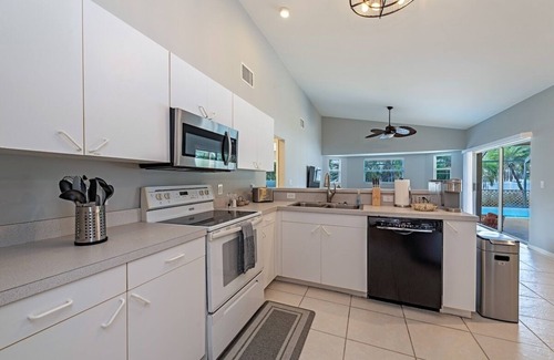 Willoughby Acres House | Lux Naples! Heated Pool ~ Fenced Yard ~ Near Beach