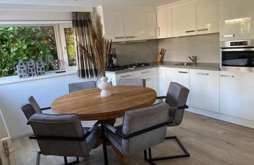 Hoevelaken Ski Chalet | Luxe chalet met airco bij bos en zwemwater