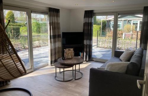 Hoevelaken Ski Chalet | Luxe chalet met airco bij bos en zwemwater