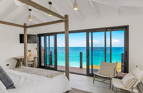 Fryes Beach Hotel | Luxe Coastal 3 BedRoom with Panoramic Views of the Caribbean Sea and Beach