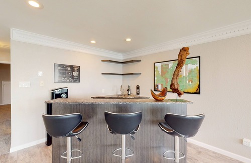 Rowlett House | Luxe, lakefront home with amazing private pool with fountain & home office