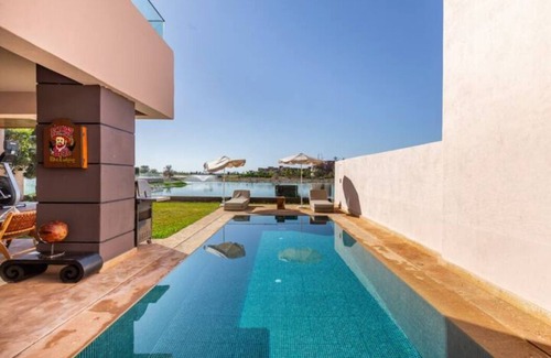 Hivernage Villa | Luxe Retreat Villa: 4 Bedroom Villa on Golf Course. Pet Friendly!