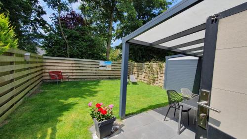 Dirkshorn House | Luxe zomerwoning met omheinde tuin voor hond en kinderen