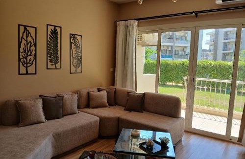 Sheikh Zayed City Apartment | Luxerious apartment with a private garden and pool access