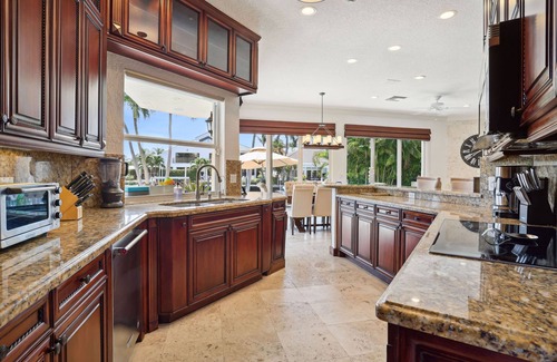 Tropic Isle House | Luxurious Delray Beach Waterfront Pool Home with VIP Beach Passes! Pet Friendly!