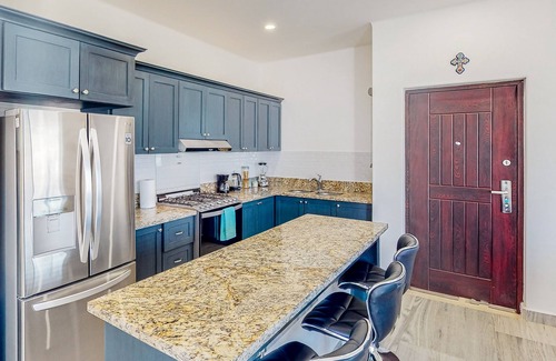 El Tezal Apartment | Luxurious mountain-view apartment close to the sea with rooftop sunset views