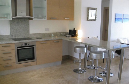 Peyia Town Apartment | Luxurious, top floor apartment with infinity pool. and stunning panoramic views