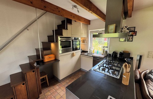 Sande House | Luxurious vacation home directly on the Ems-Jade Canal Sauna, hot tub, whirlpool, fireplace