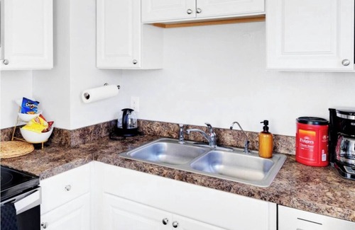 East Raleigh House | Luxury 2BD Home, Coffee, Games, Outdoor Seating, Close to Airport, Hospitals