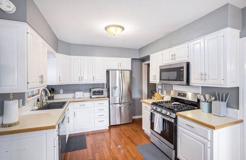 Linden House | Luxury 3 bedroom waterfront home with indoor hot tub, sauna, paddle boat & kayak