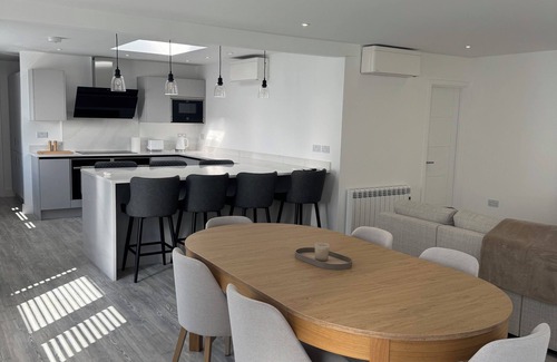 Mont Fiquet Apartment | Luxury 4 double bed apartment directly on the beach in stunning St Brelades Bay.