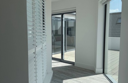 Mont Fiquet Apartment | Luxury 4 double bed apartment directly on the beach in stunning St Brelades Bay.