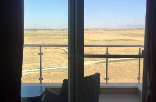 Trikomo Apartment | Luxury 8th floor apartment in 5* Resort with views to the sea and mountains