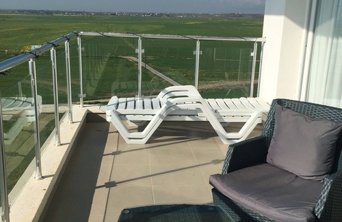 Trikomo Apartment | Luxury 8th floor apartment in 5* Resort with views to the sea and mountains