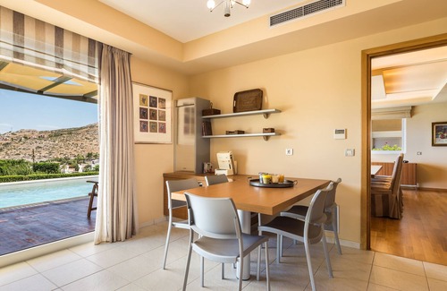 Palaia Fokaia House | Luxury accommodation near Sounio with panoramic sea views and private parking.