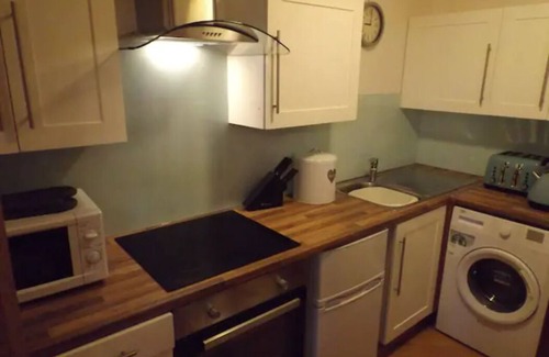 South Galson Apartment | Luxury Apartment, parking, cycle locker and outdoor sitting area.