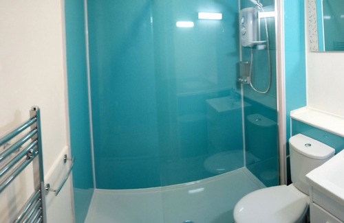 South Galson Apartment | Luxury Apartment, parking, cycle locker and outdoor sitting area.