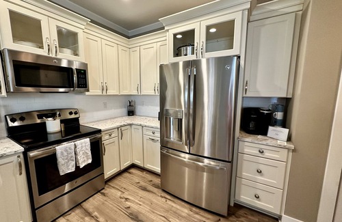 Sherman Hill Condo | Luxury condo. 2 car garage, rooftop patio. Perfect for work or play!
