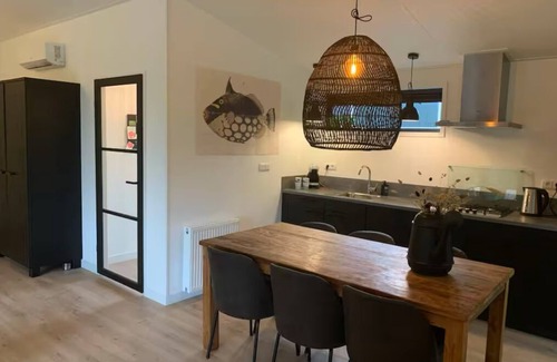 Pingjum House | Luxury holiday cottage, stunning views, and hot tub.